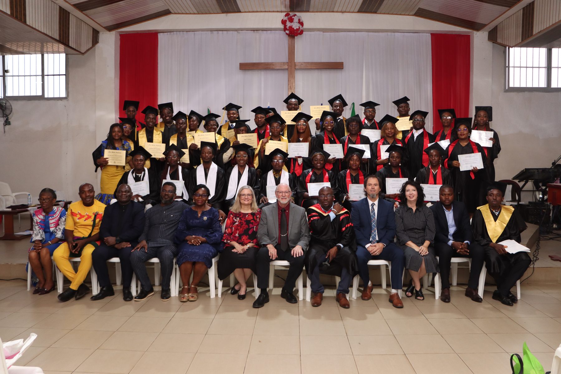 FIRE Bible Institute graduation class with Pastor Denis Ekobena and faculty